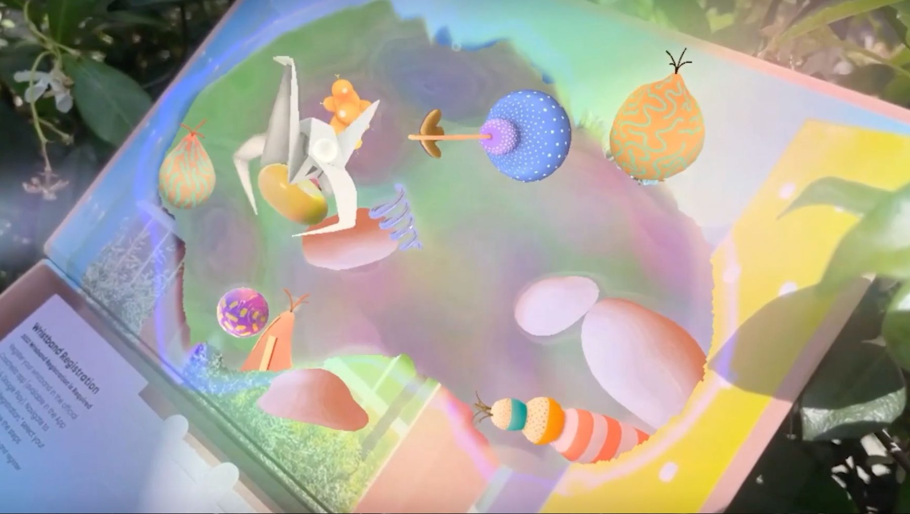 The Coachella welcome box activating in AR with floating characters