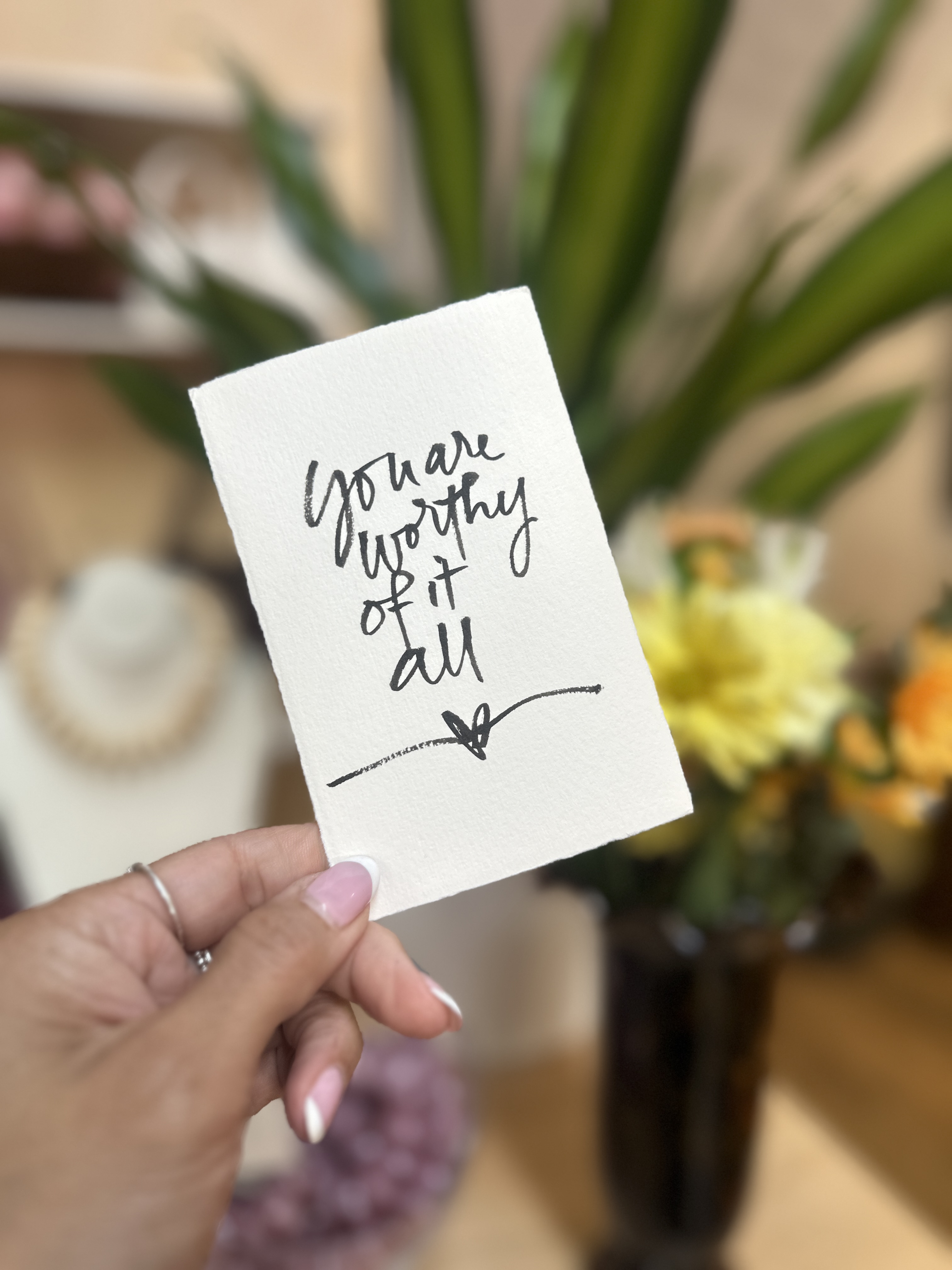 Hand-lettered card reading You are worthy of it all