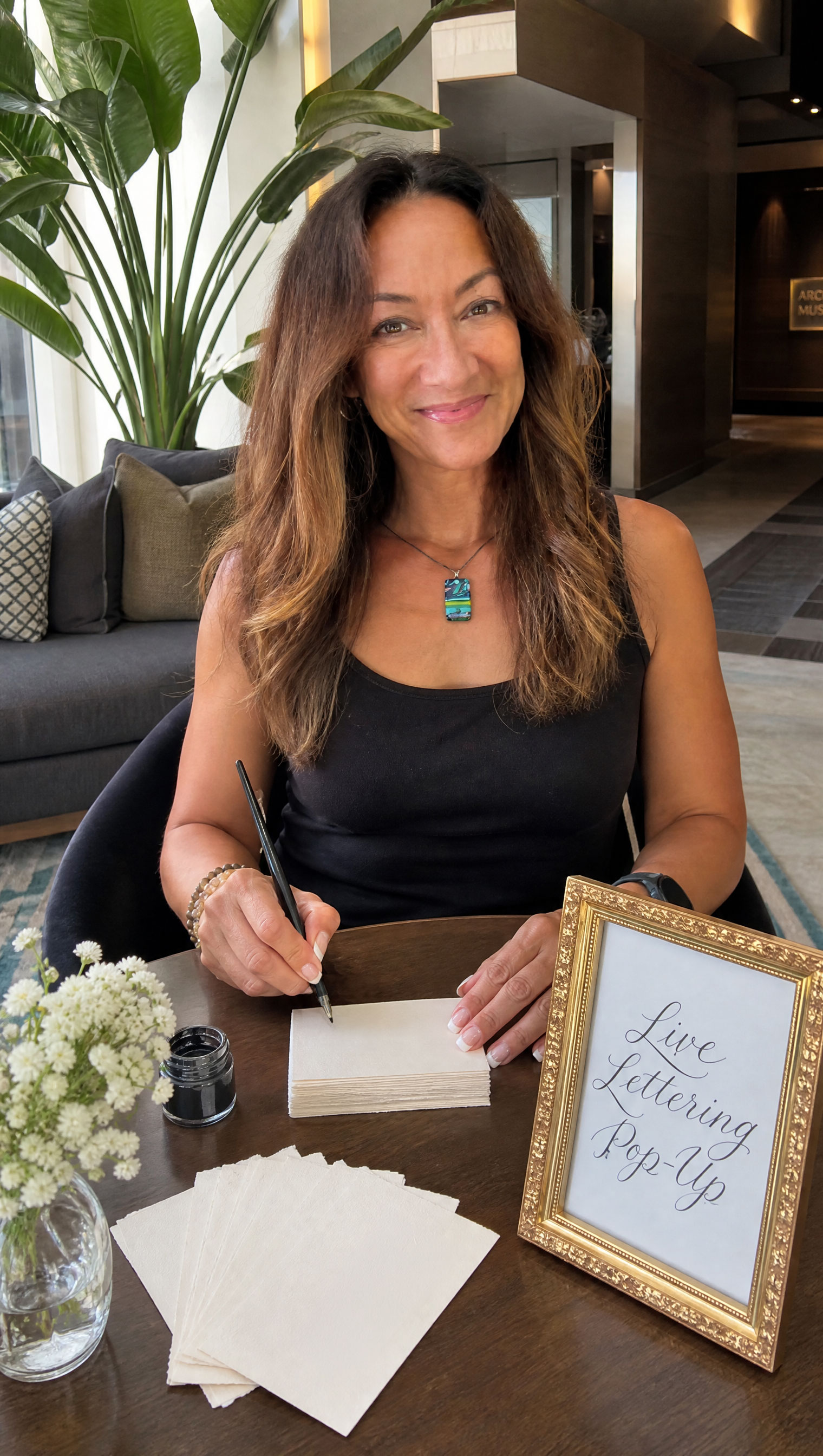 Lianne lettering live in a boutique shop
