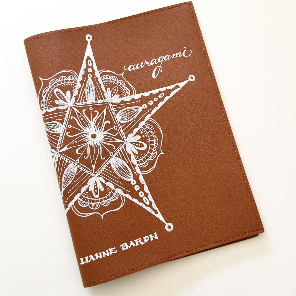 Hand-painted parol collector cover in cognac vegan leather, from the Auragami founding edition